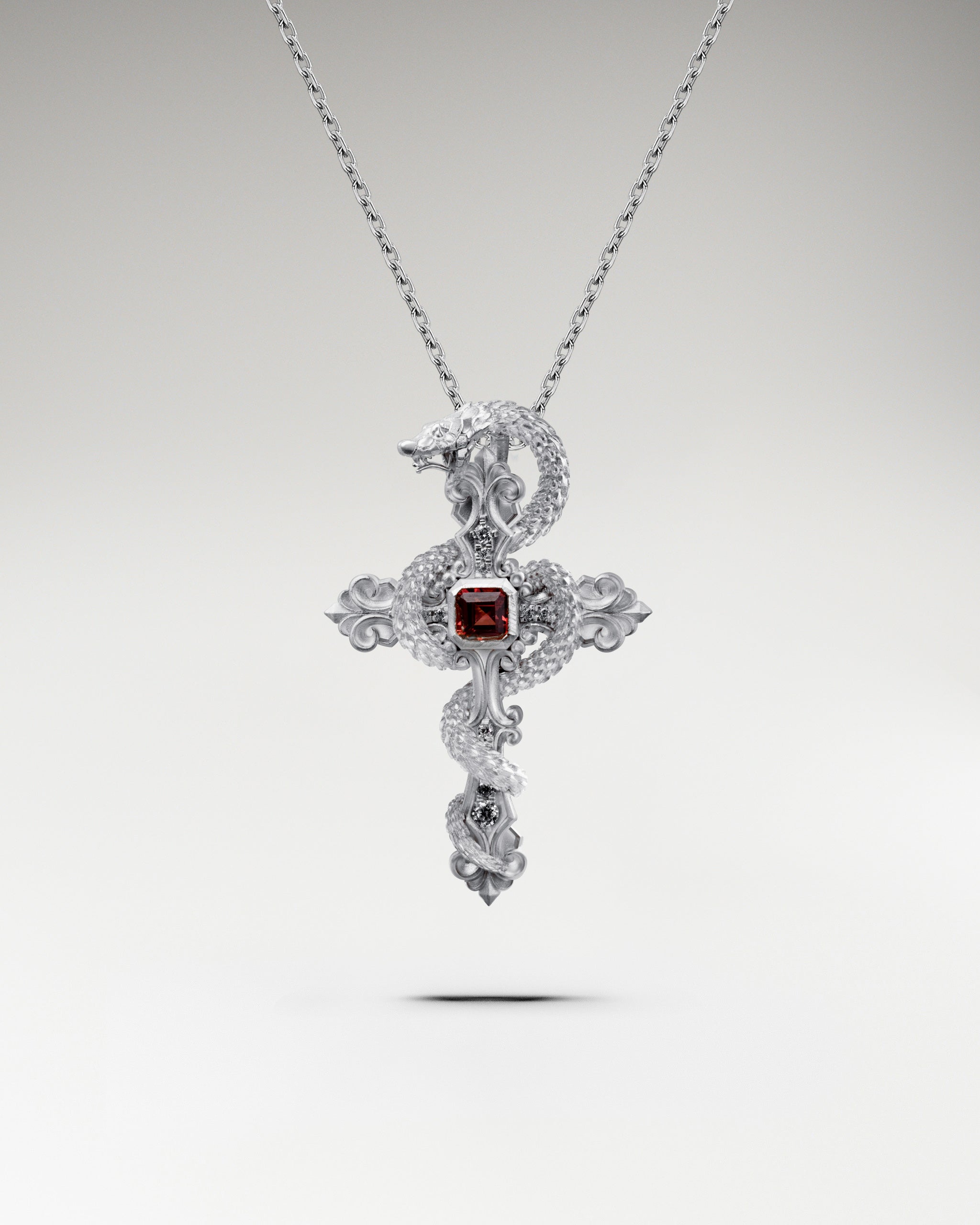 ガーネットをあしらったスターリングシルバーの禁断のペンダントネックレス