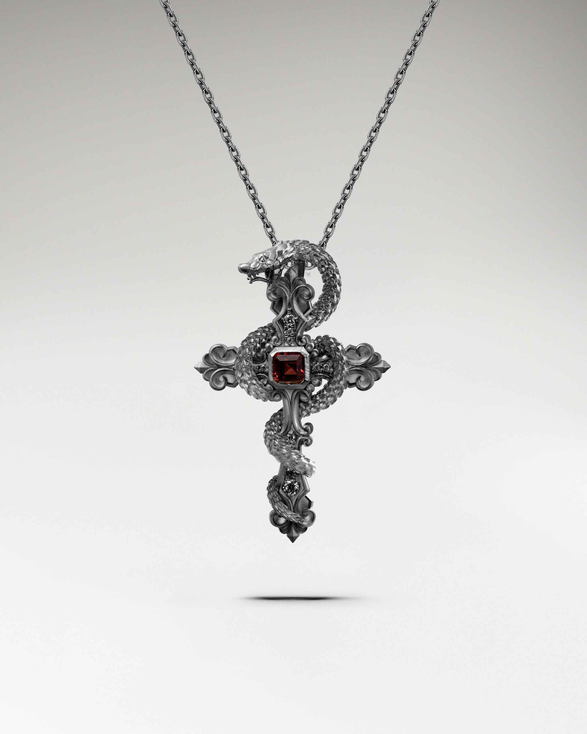 ガーネットをあしらったスターリングシルバーの禁断のペンダントネックレス