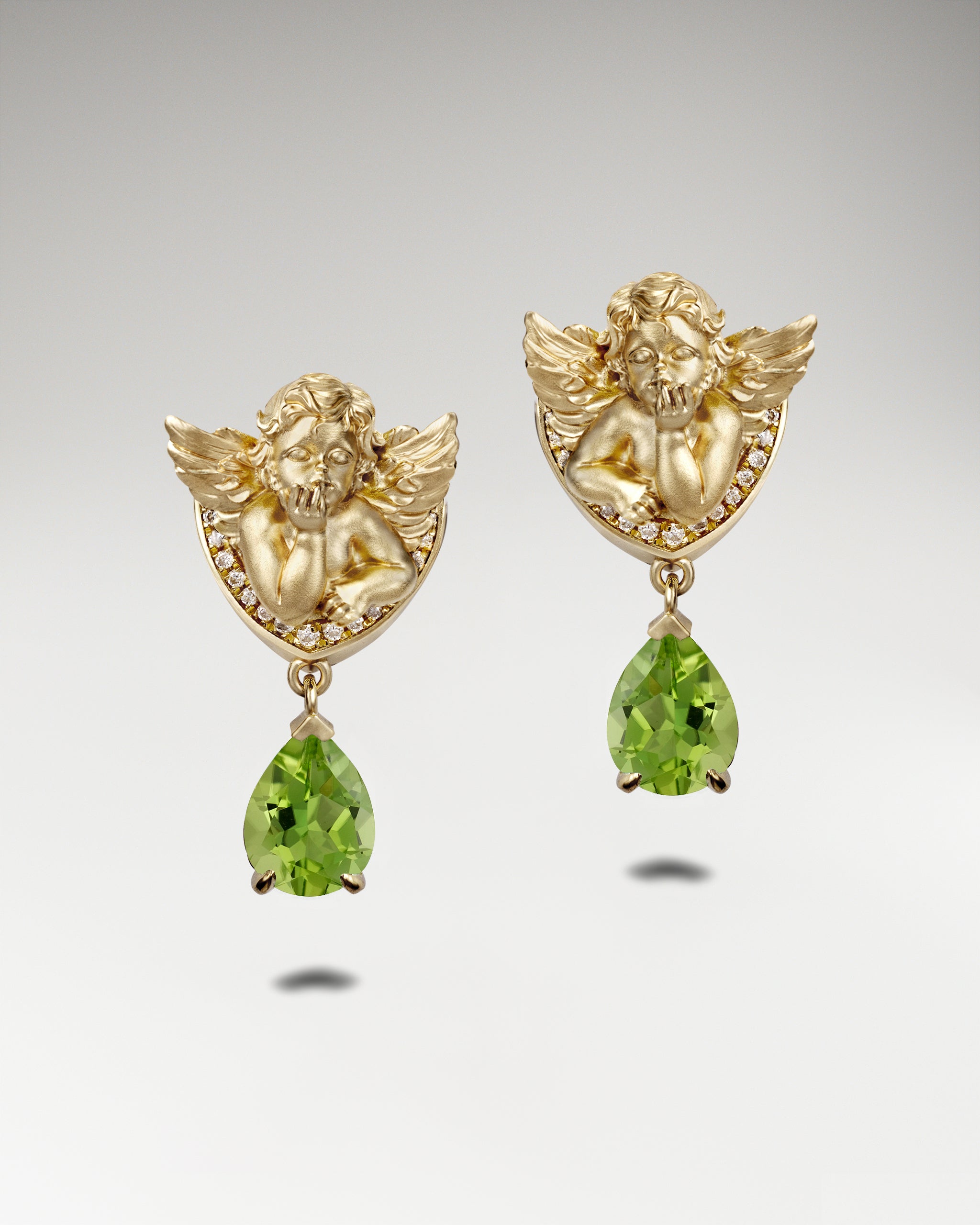 Winged Serenity Earrings In Sterling Silver With Topaz