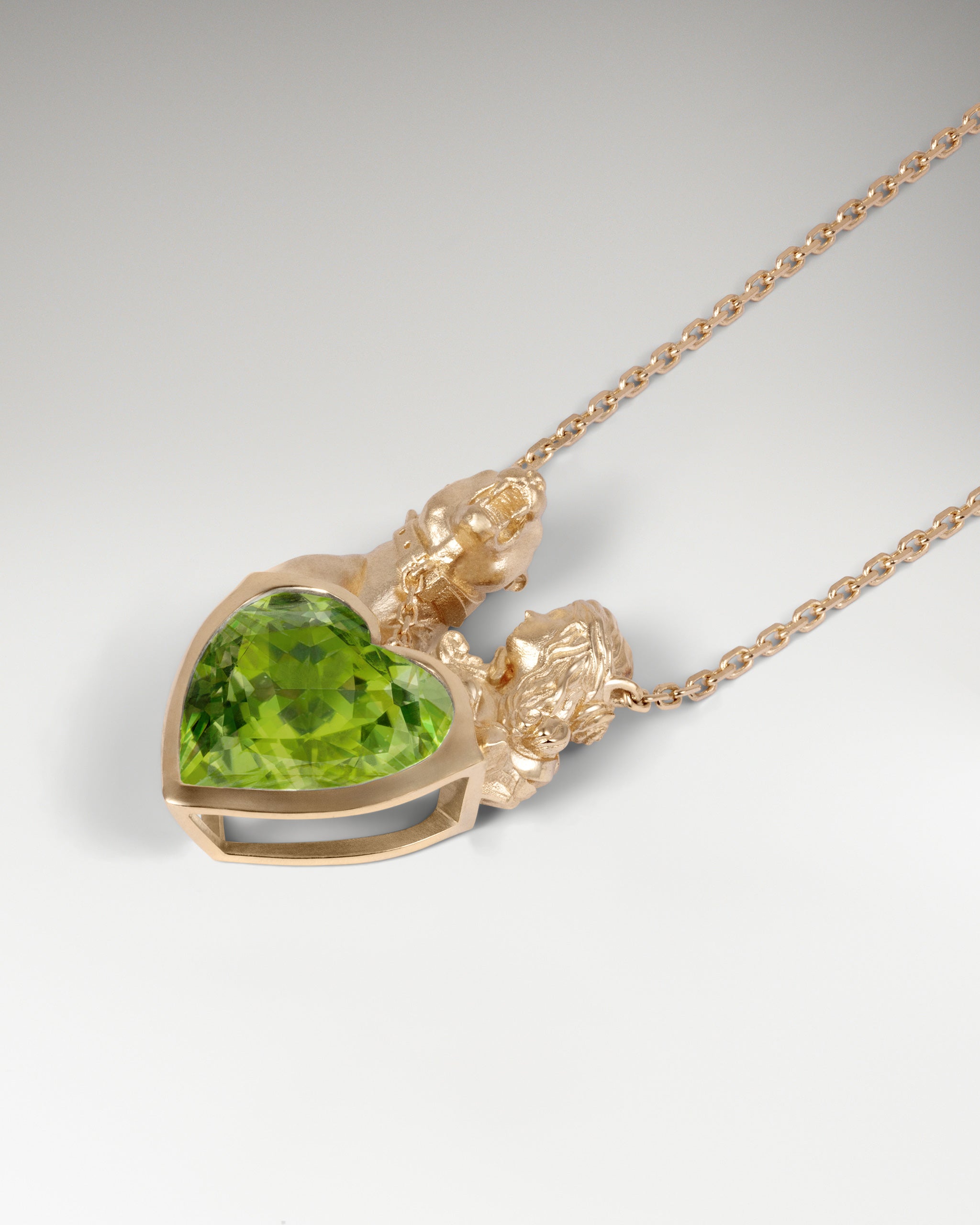 Collar Corazón de la Dualidad en Oro con Topacio Azul Cielo