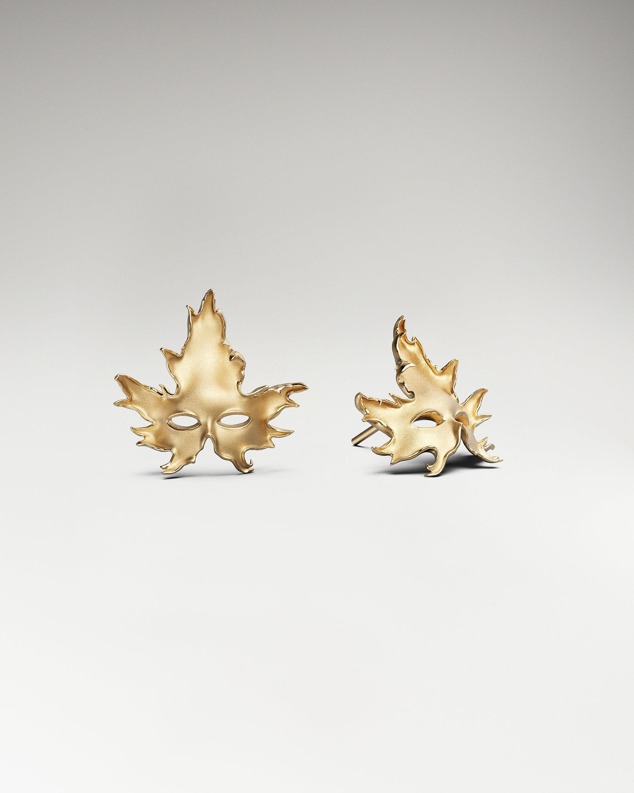 Maple Leaf Mask Stud Earrings In Sterling Silver