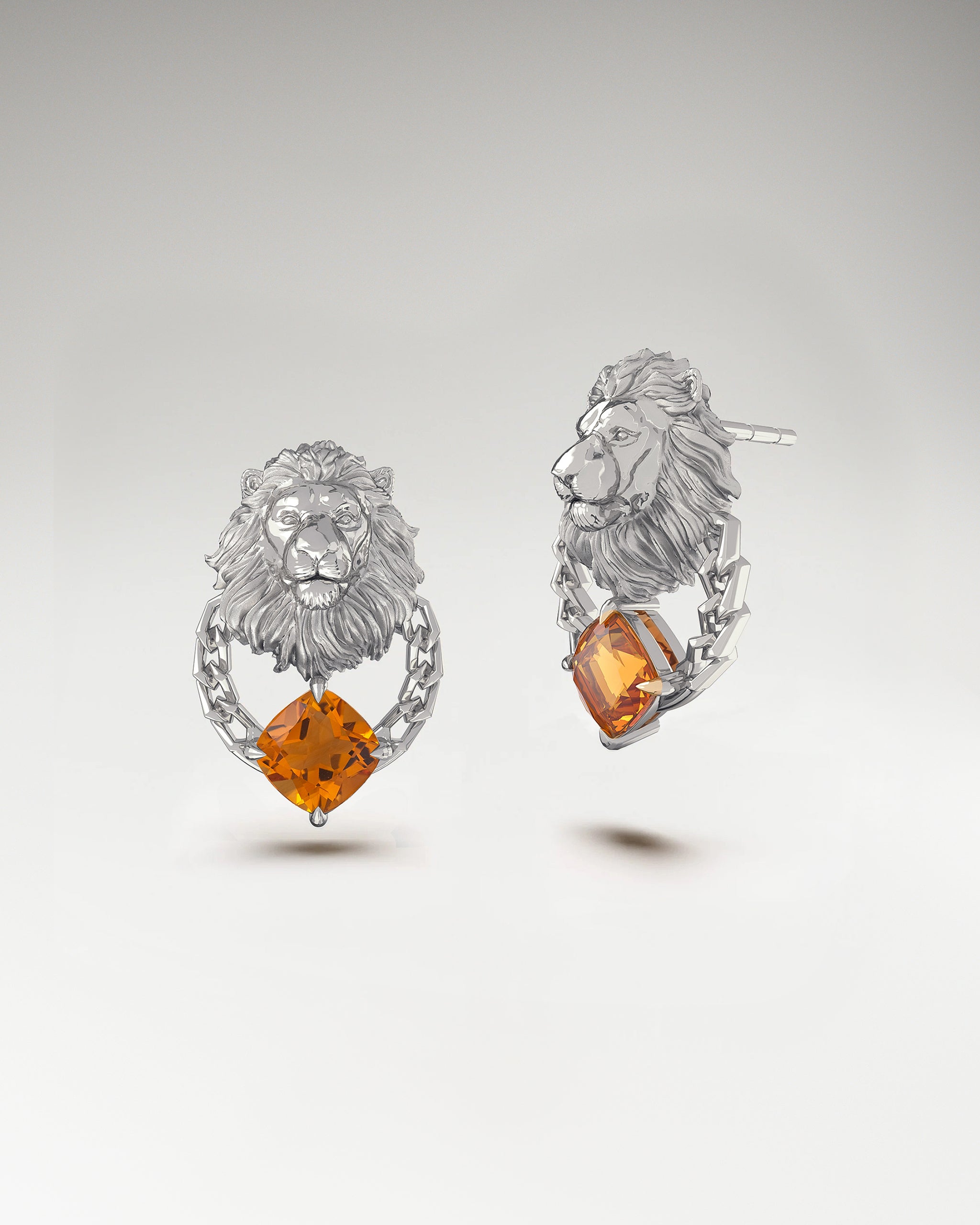 スペサルタイトを使用したゴールドのレオ スタッド ピアス