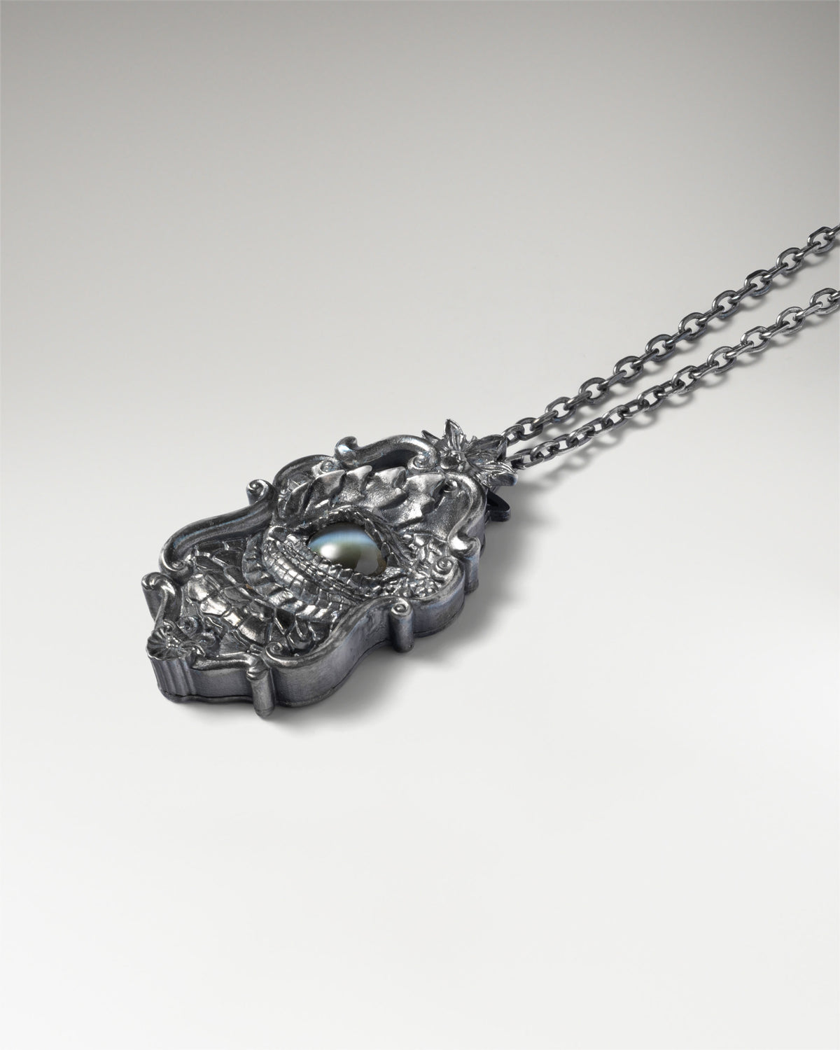Noir Dragon Gaze Pendant In Sterling Silver With Amethyst