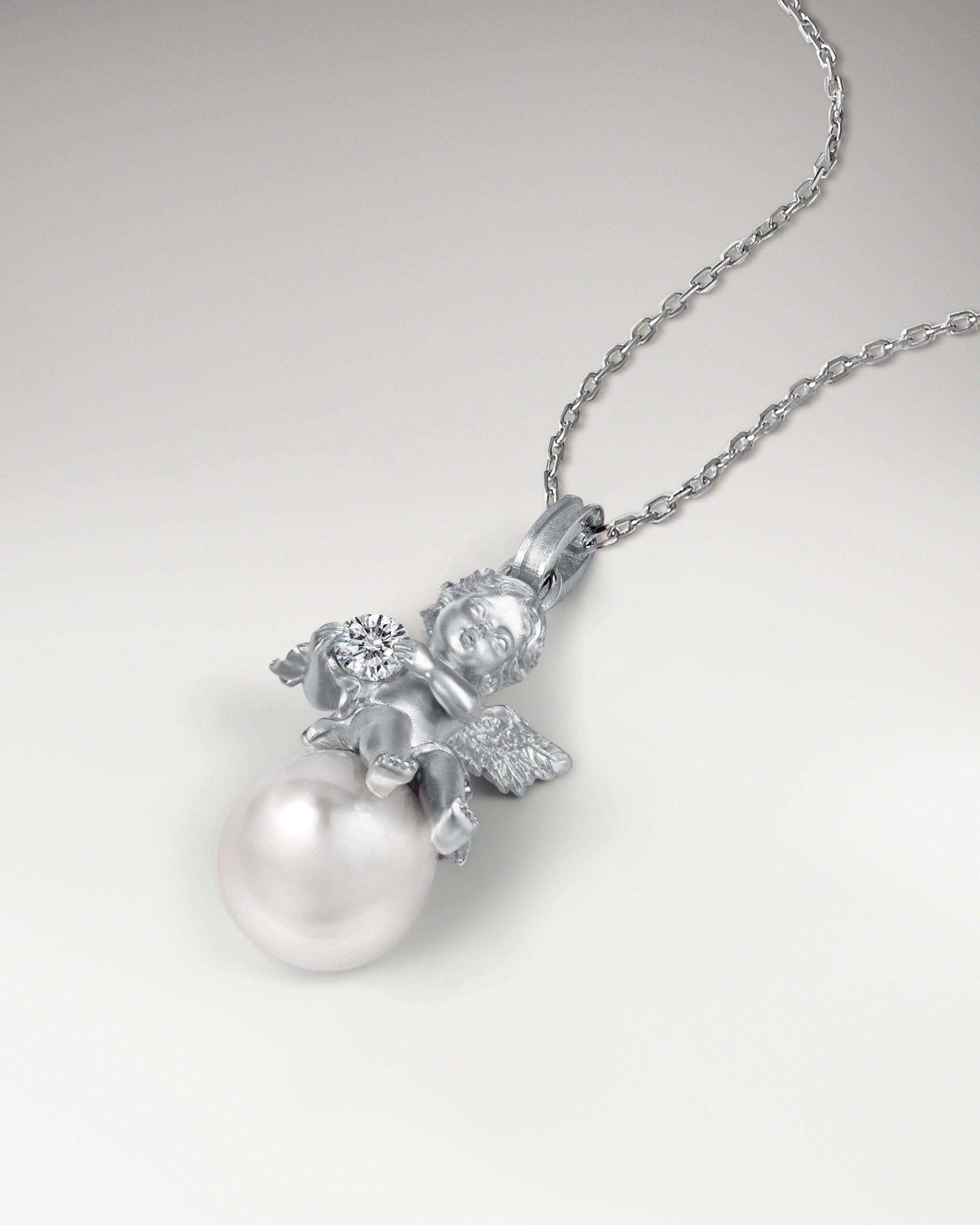 トパーズ付きスターリングシルバーのキューピッドペンダントネックレス