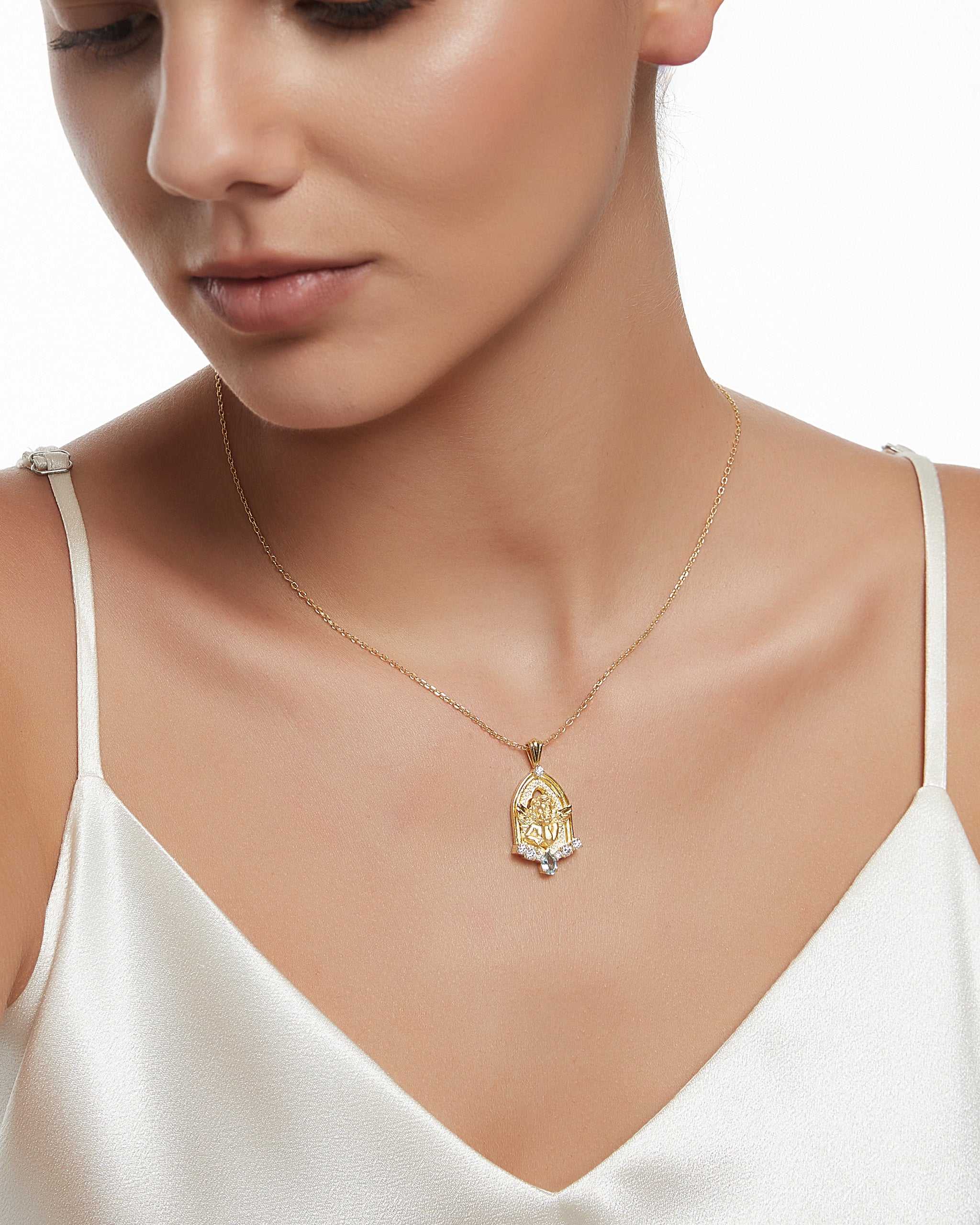 Celestarch Pendant Necklace in Sterling Silver with Topaz