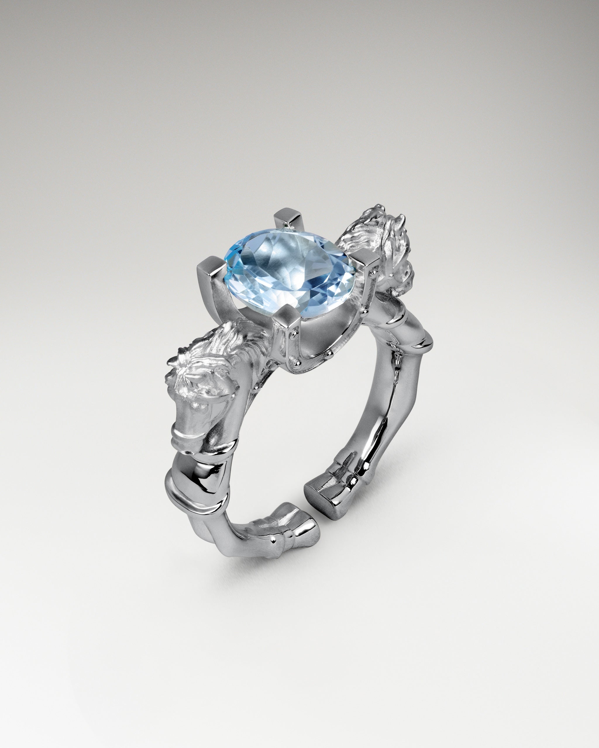 Twin Stallion Ring In Sterling Silver With Blue Topaz