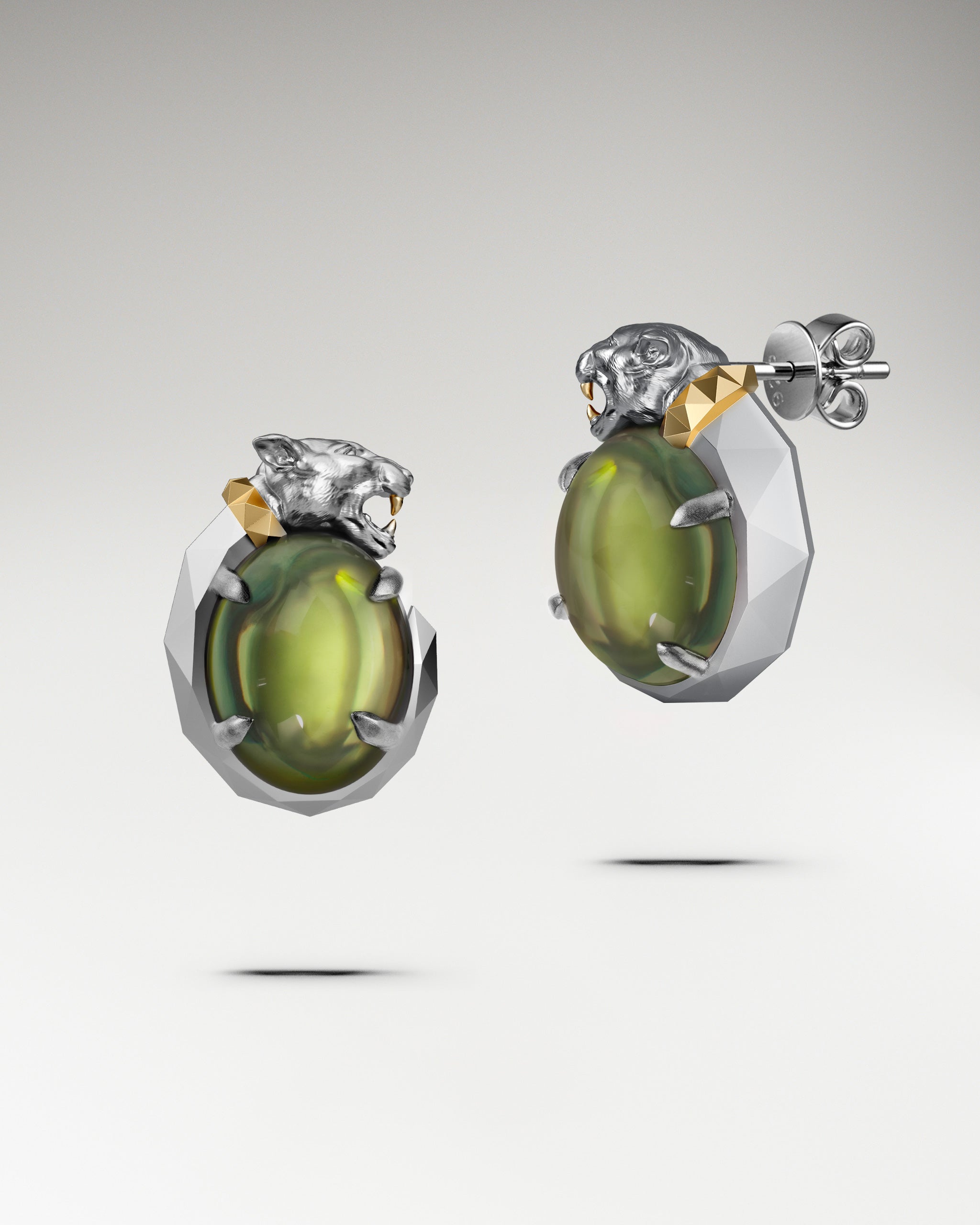 Panther’s Fang Earrings In Sterling Silver With Garnet