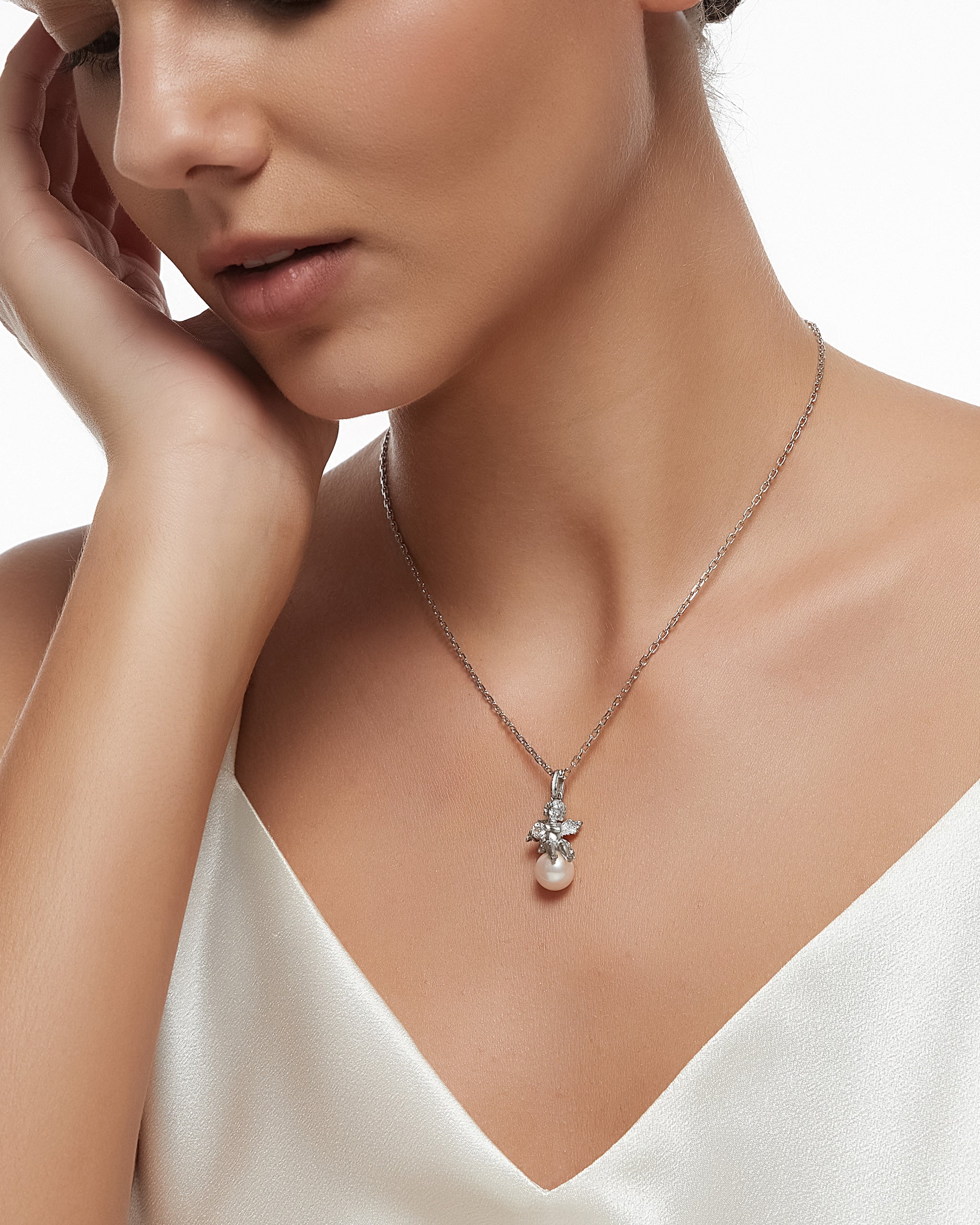 トパーズ付きスターリングシルバーのキューピッドペンダントネックレス