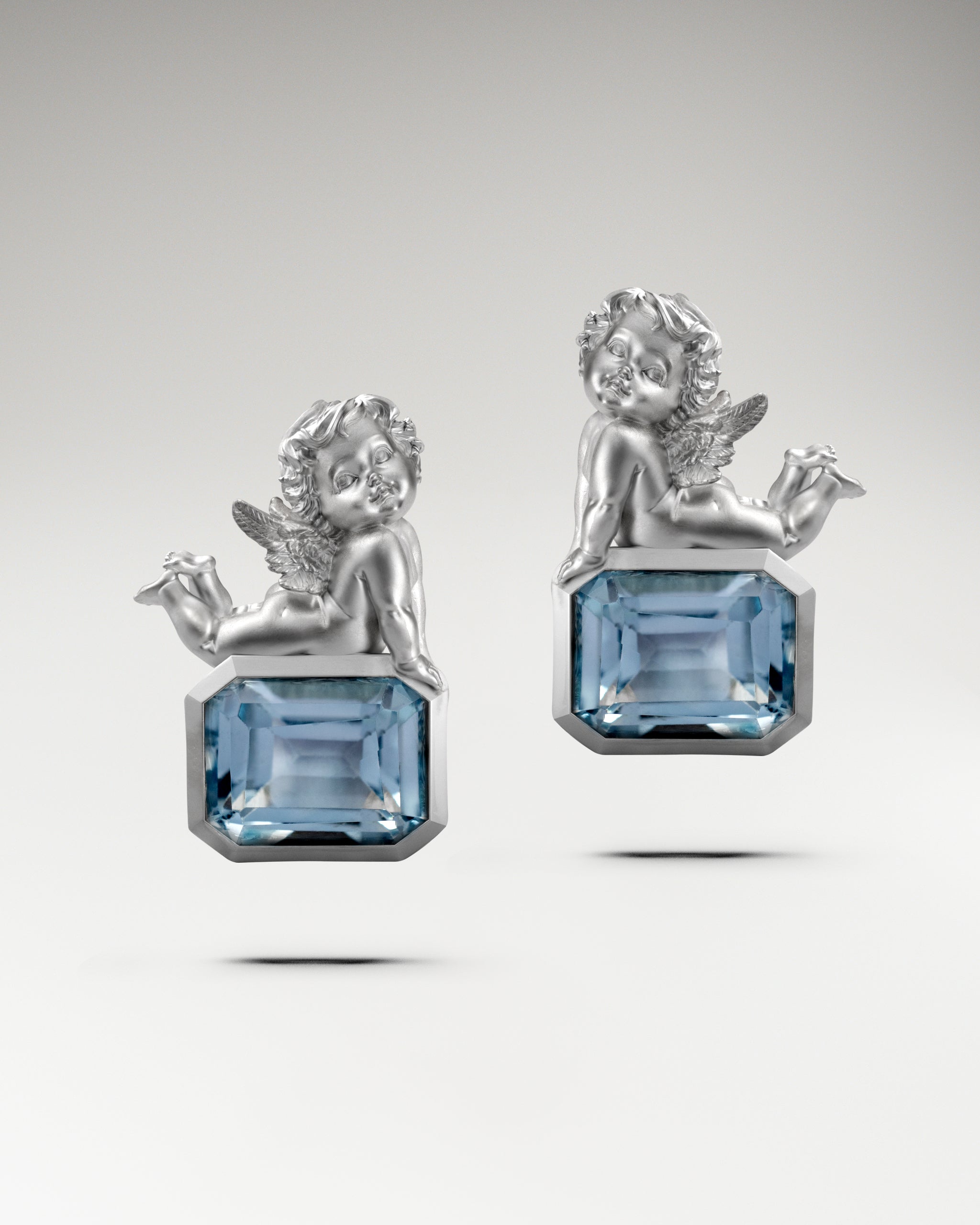 Amor-Ohrhänger aus Sterlingsilber mit Topas