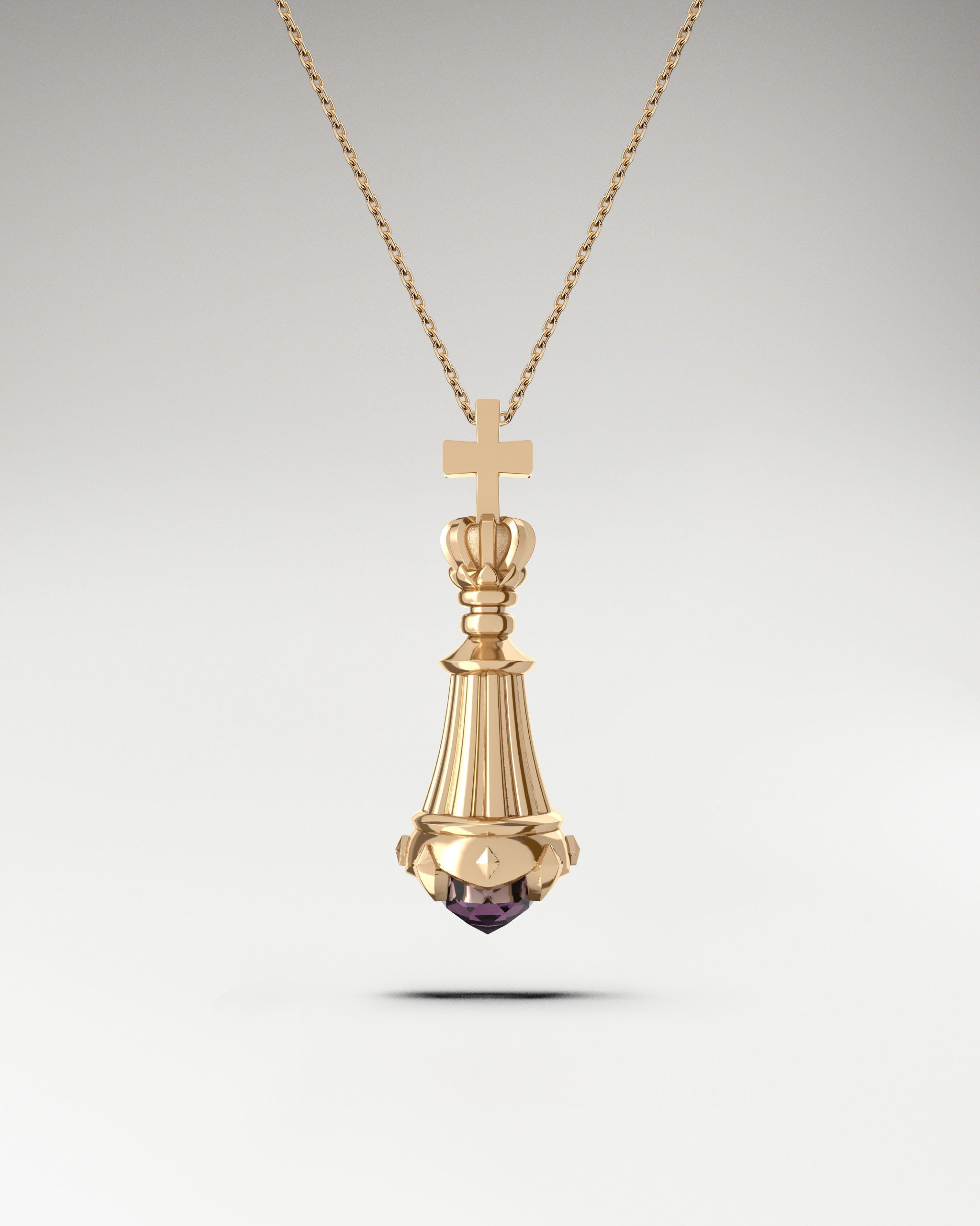 Gold king chess necklace with spinel gemstone.