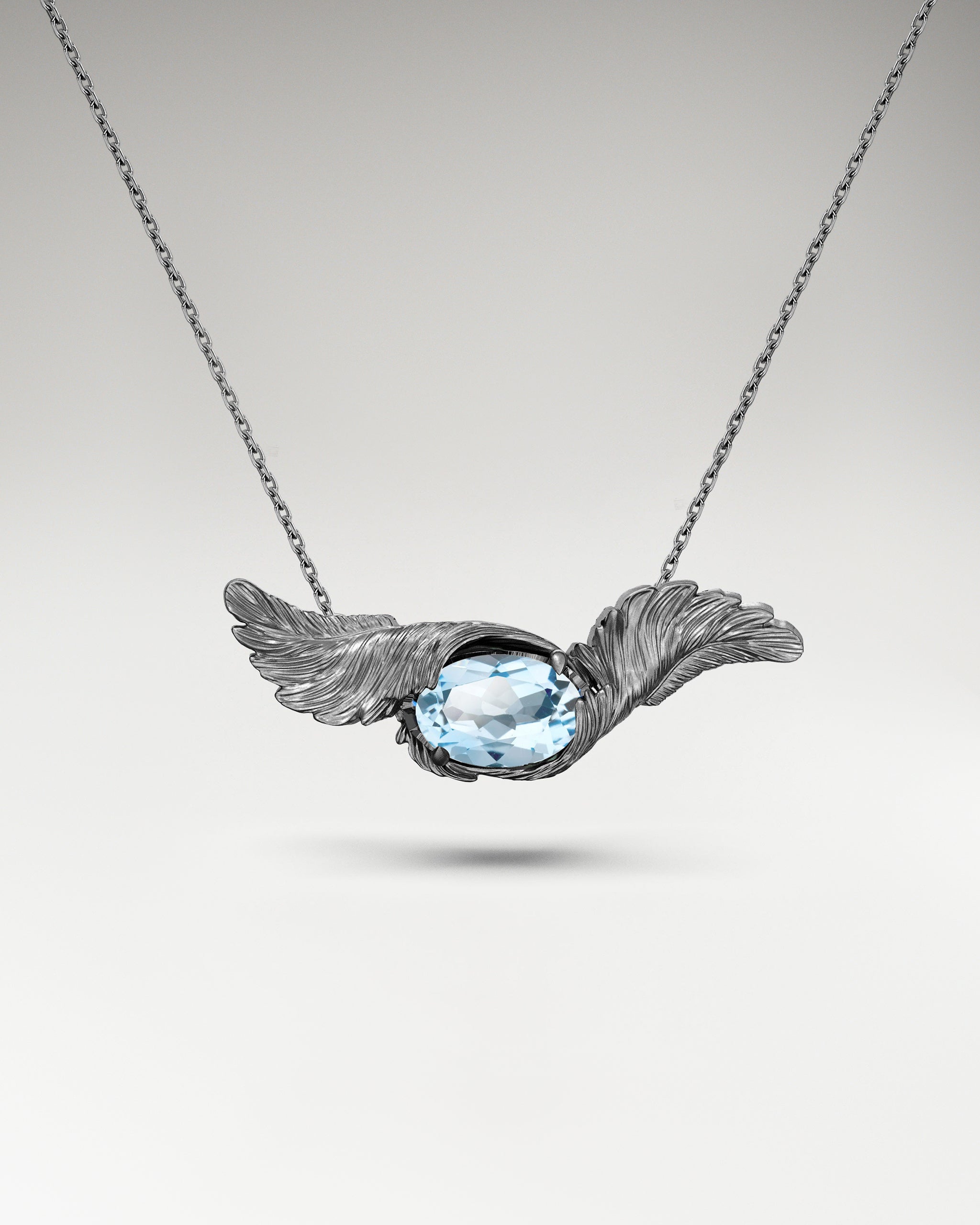 Collier à pendentif Feather Embrace en argent sterling avec topaze