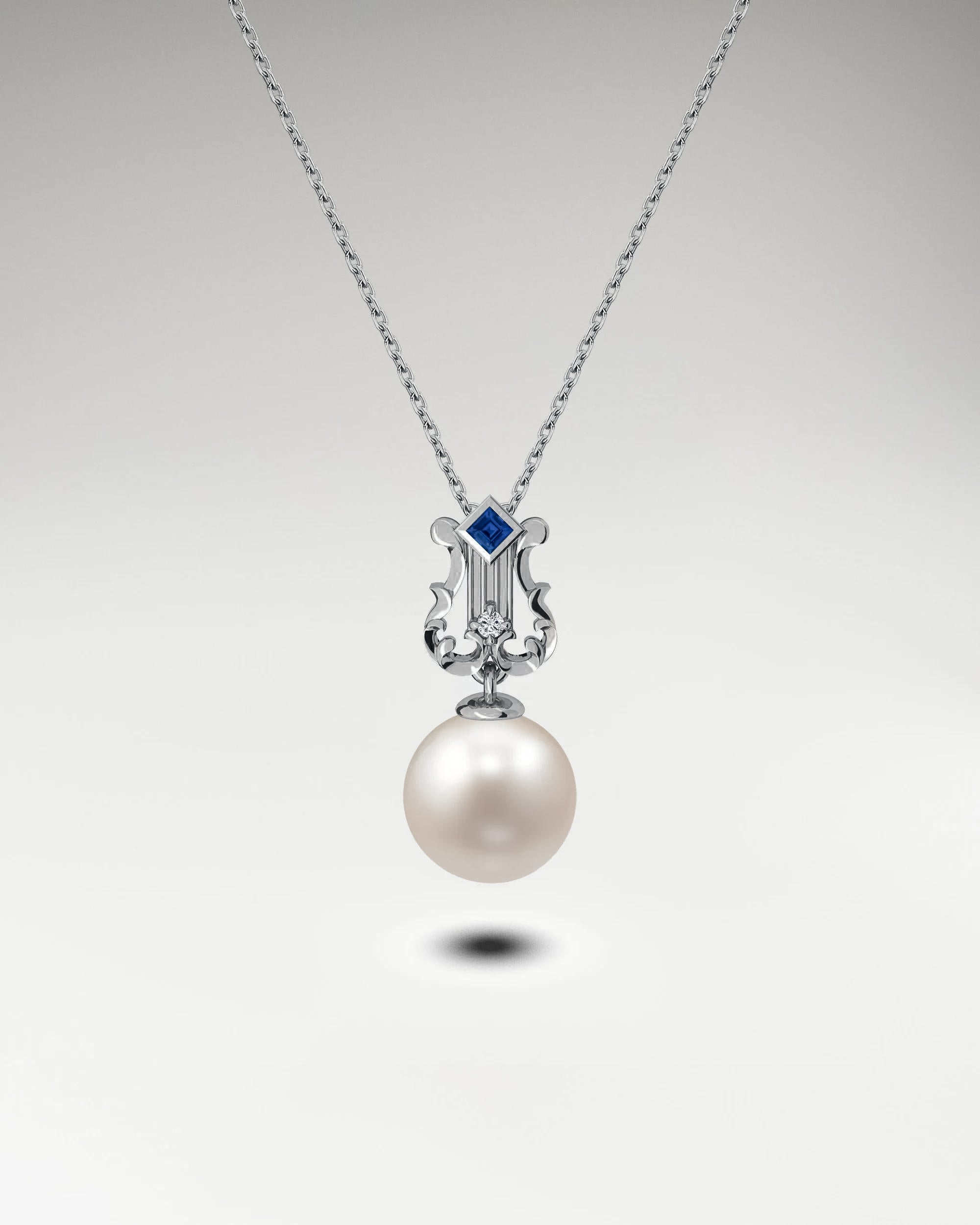 パールとブルーサファイアをあしらったゴールドのMy Little Lyreネックレス