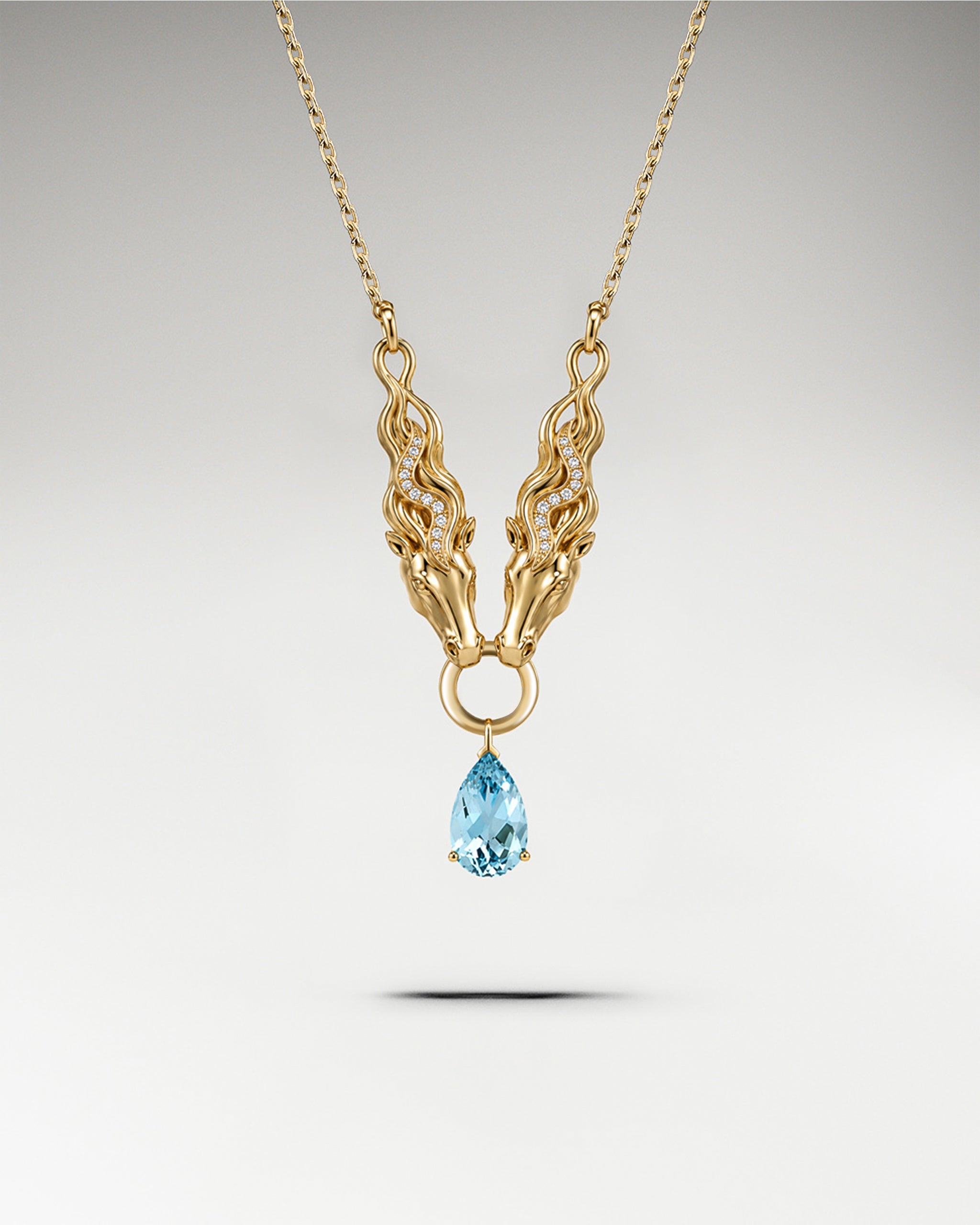 Dual Stallion Pendant In Sterling Silver With Topaz