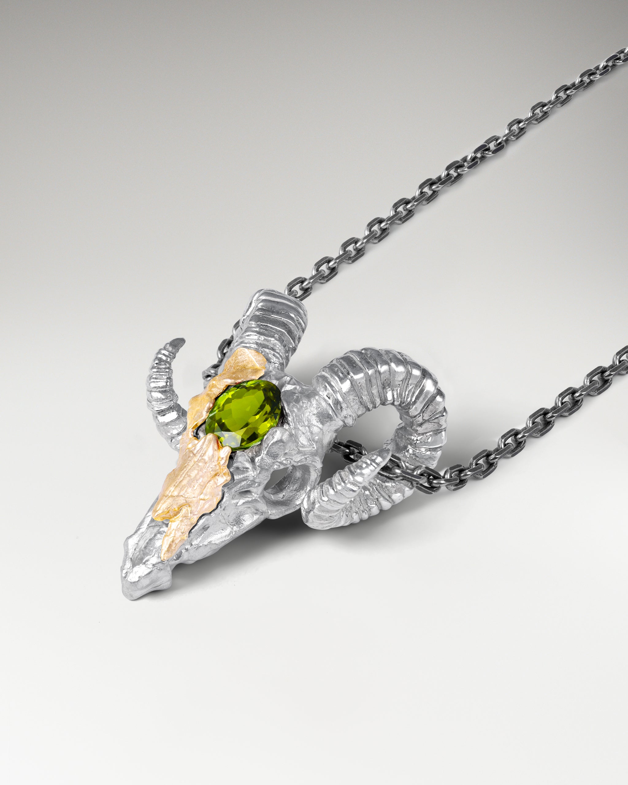 The Ram's Heart Pendant Necklace In Sterling Silver With Garnet