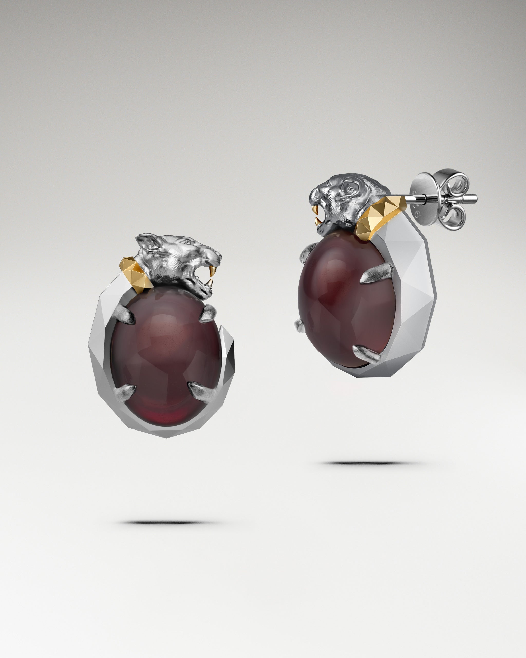 Panther’s Fang Earrings In Sterling Silver With Garnet