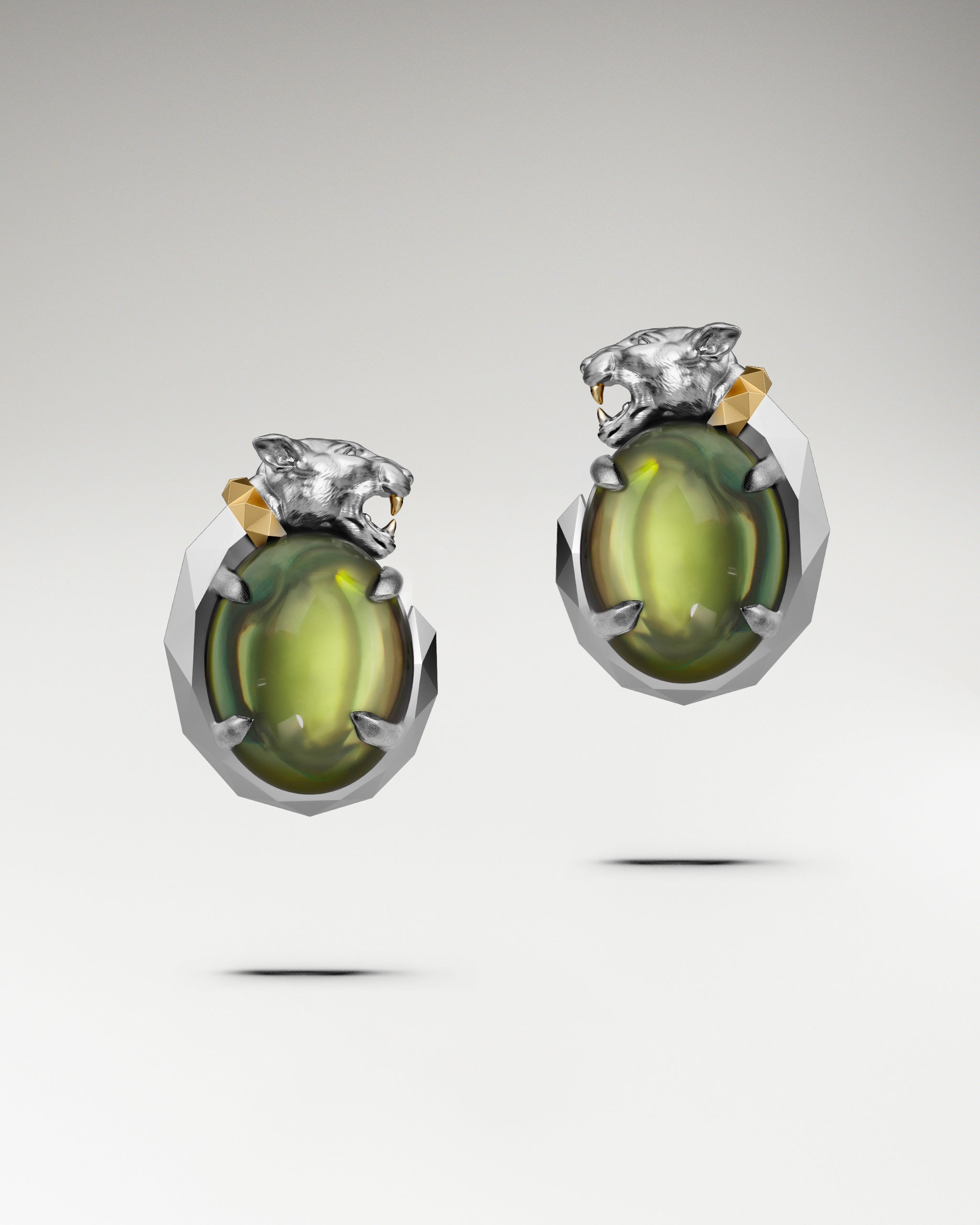 Panther’s Fang Earrings In Sterling Silver With Garnet