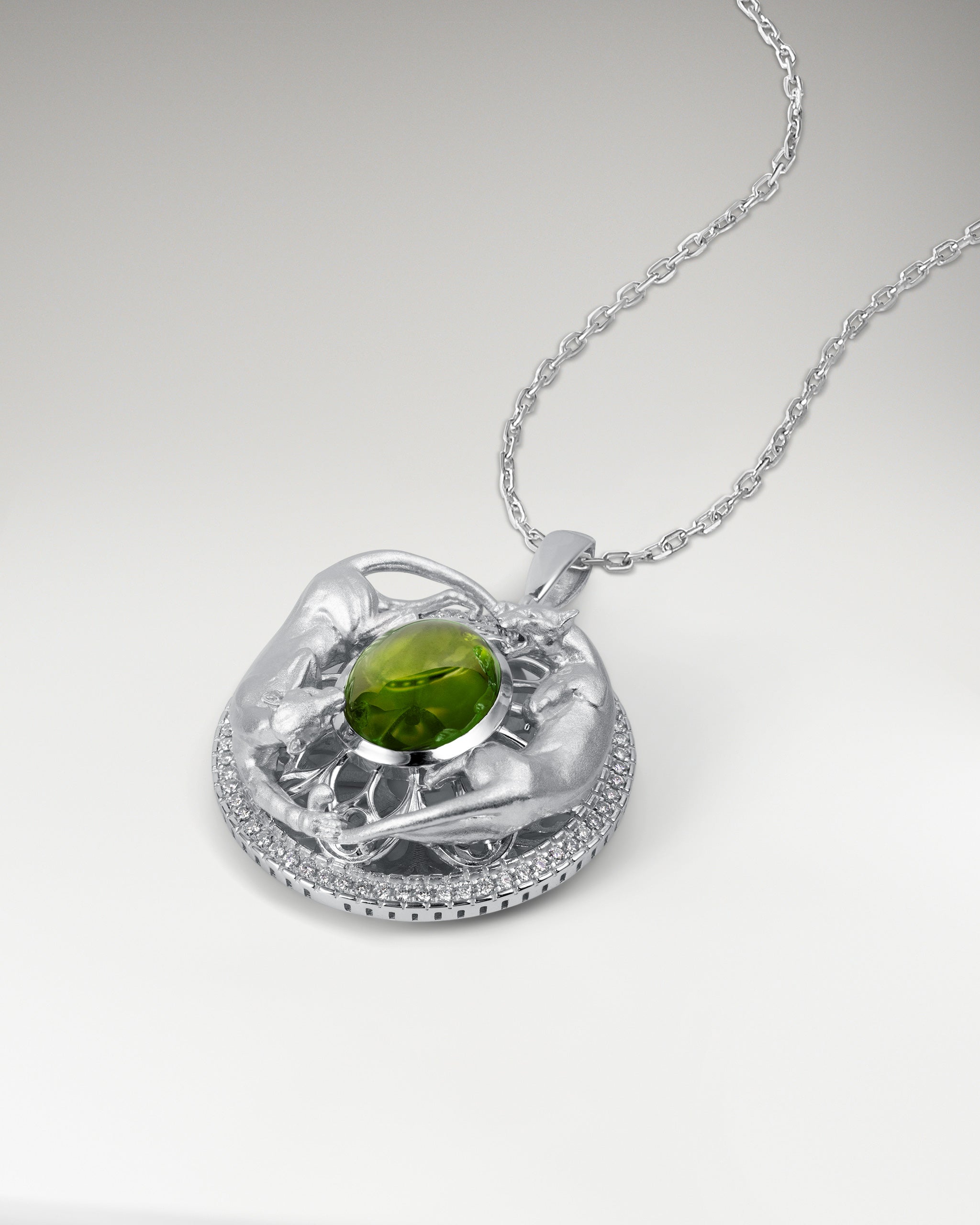 Twin Panthers Medallion Pendant Necklace In Sterling Silver With Garnet