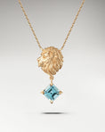 Load image into Gallery viewer, Golden lion head pendant necklace with aquamarine
