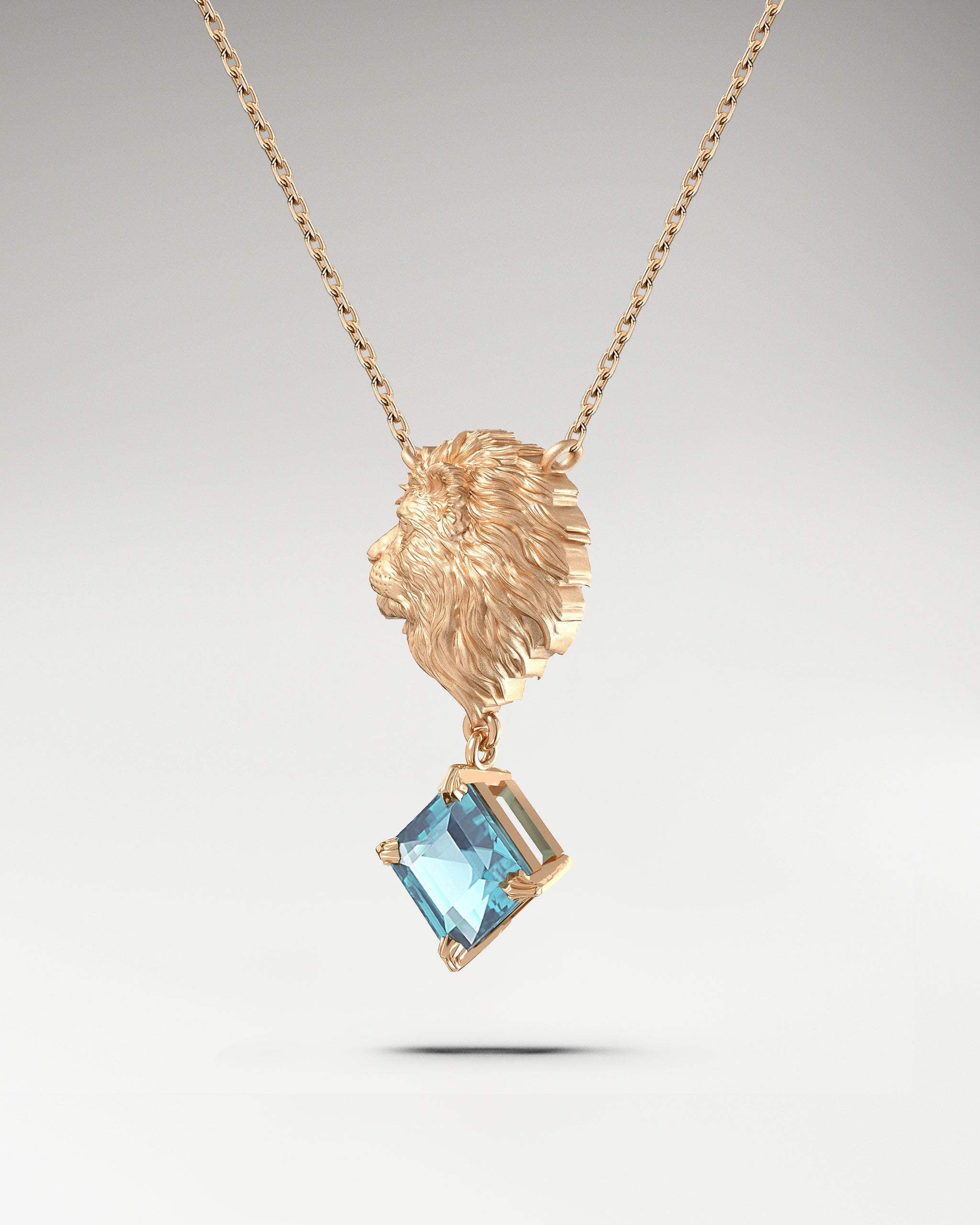 Lion Head Pendant Necklace in 10k gold with aquamarine