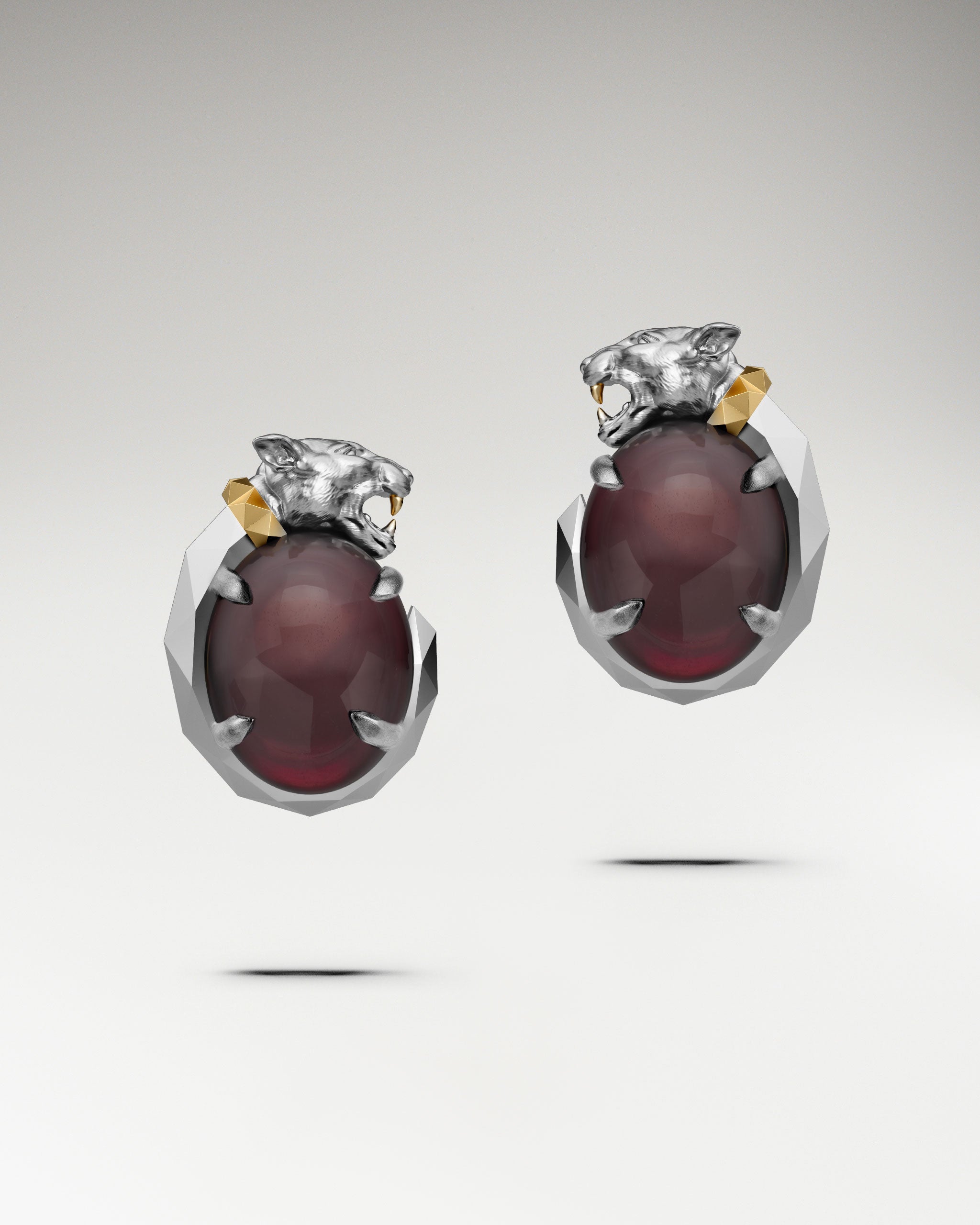 Panther’s Fang Earrings In Sterling Silver With Garnet