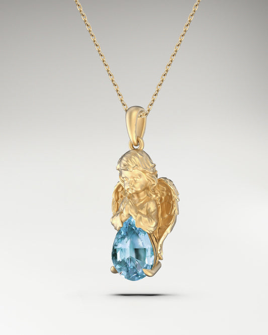 baby angel necklace made in gold and aquamarine