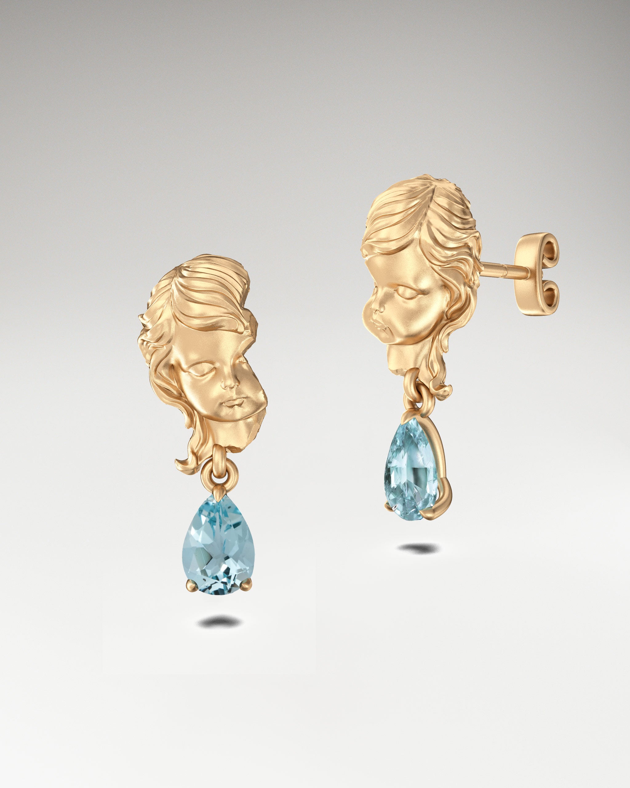 gold cupid angel dangle earrings with aquamarine gemstone